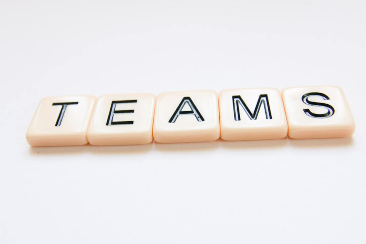A leader fostering an environment of constructive dissent, sparking innovation in a collaborative team setting.